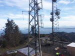 Dale Mosby K7FW on tower replacing network cable for KMUN.